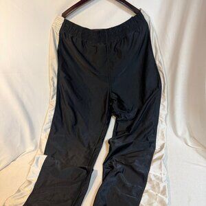Vintage Reebok track pants with elastic waist, drawstring pant leg, men's